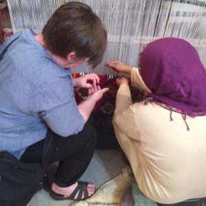 Jo Lehman and rug weaver in the Atlas Mountains